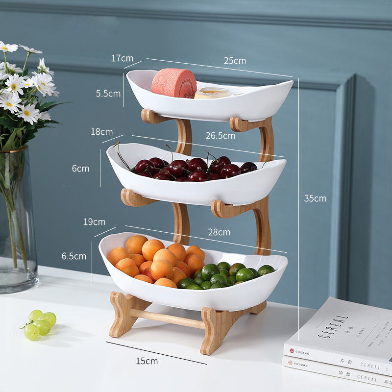Beige multi-layer fruit rack by BACKUPMYFILESNOW.COM® with two tiers for organized fruit storage.