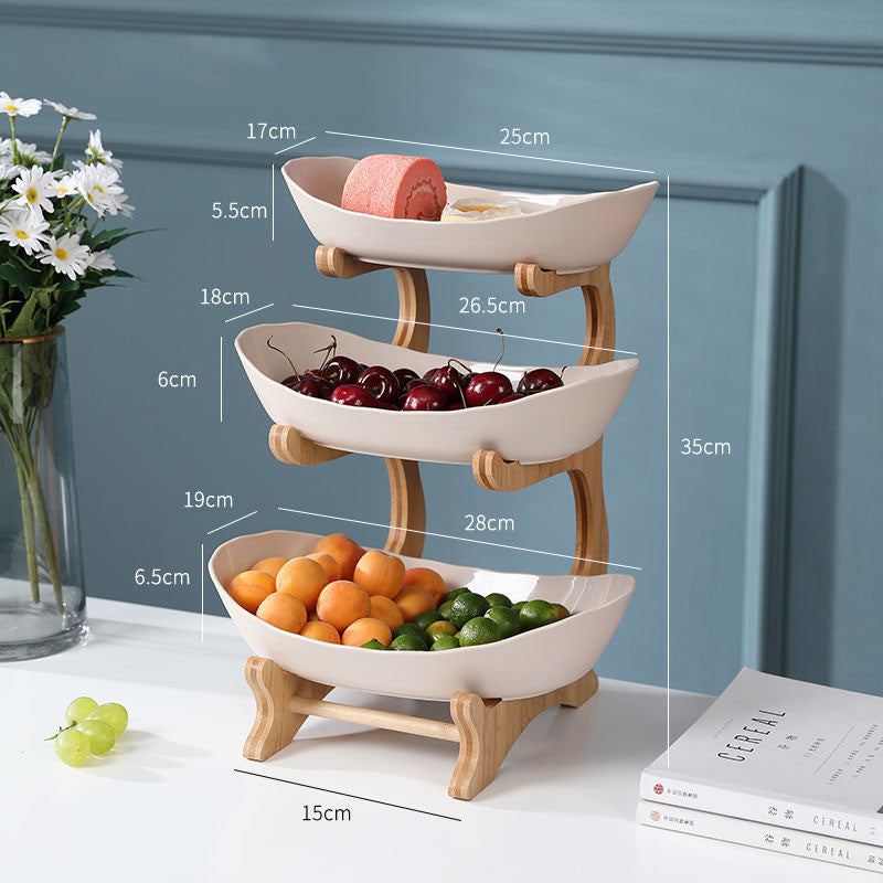 Beige multi-layer fruit rack by BACKUPMYFILESNOW.COM®, featuring two tiers for organized fruit storage.