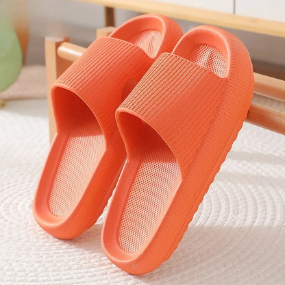 Beige EVA thick sole beach slippers with 4cm height increase, cloud-like comfort, solid color summer indoor sandals for couples.