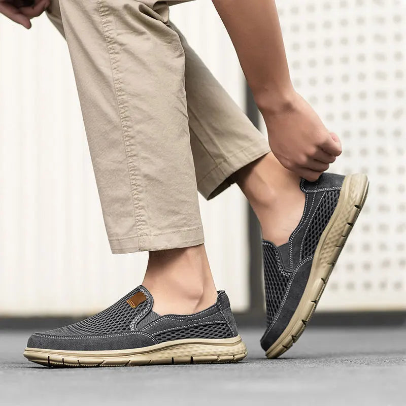 Beige men's slip-on loafers from BackupMyFilesNow.com, breathable casual shoes ideal for summer and light walking.