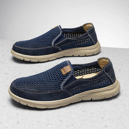 Beige men's slip-on loafers by BackupMyFilesNow.com, breathable casual shoes perfect for summer and light walking.