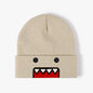 Beige embroidered knitted hat with cartoon design, suitable for men and women, warm, windproof, and trendy for autumn and winter outdoor wear.