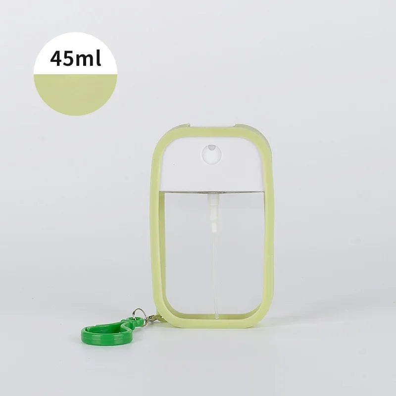 Portable 45ml square perfume spray bottle from BackupMyFilesNow.com, refillable silicone atomizer for travel and hand sanitizer.