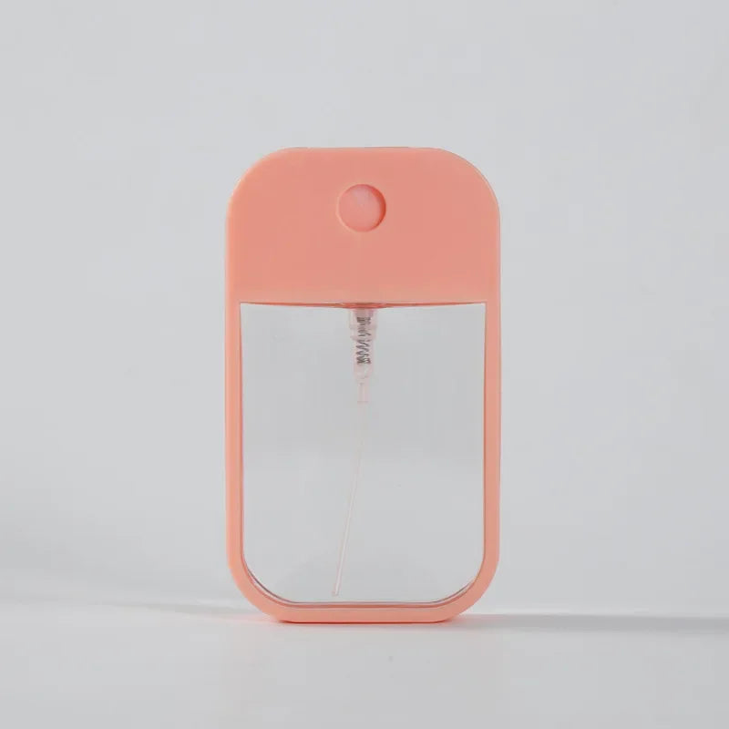 Portable 45ml square perfume spray bottle by BackupMyFilesNow.com, refillable silicone atomizer for travel and hand sanitizer use