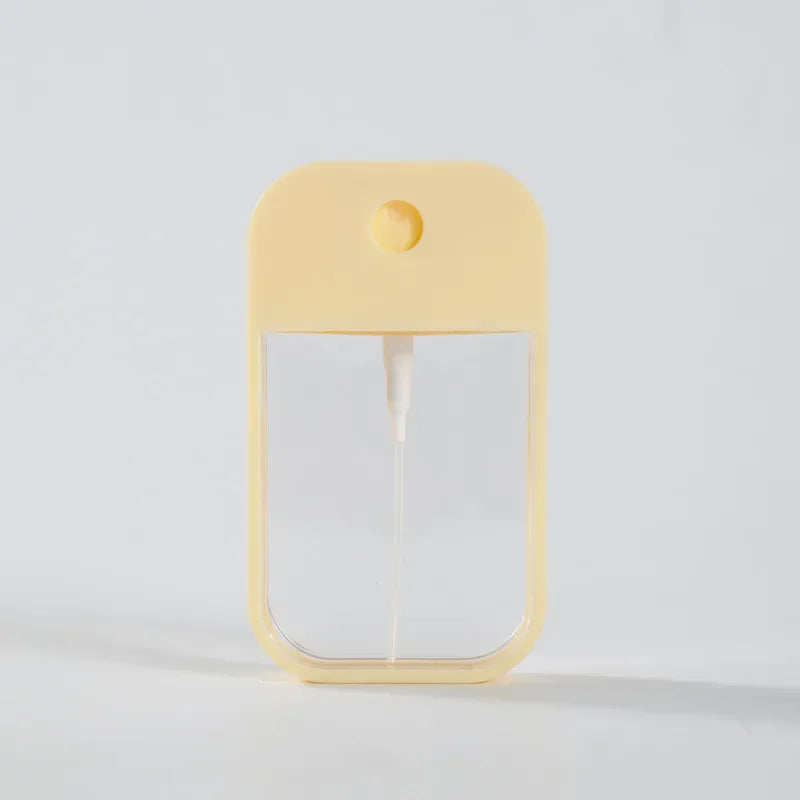 Portable 45ml square perfume spray bottle from BackupMyFilesNow.com, refillable silicone design for travel and hand sanitizer.