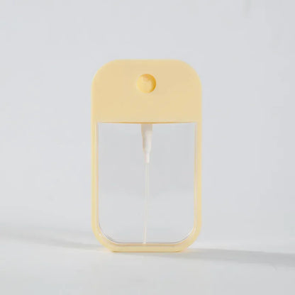 Portable 45ml square perfume spray bottle from BackupMyFilesNow.com, refillable silicone design for travel and hand sanitizer.
