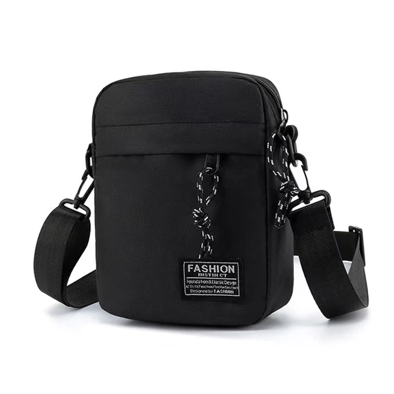 Black men's nylon shoulder or cross-body bag for daily school use, featuring adjustable straps and a sleek, functional design.