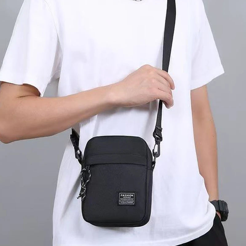Black men's nylon bag from BackupMyFilesNow.com, versatile single shoulder or cross-body design for daily school use.