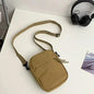Black men's nylon bag from BackupMyFilesNow.com, available as single shoulder or cross-body, ideal for daily school use.