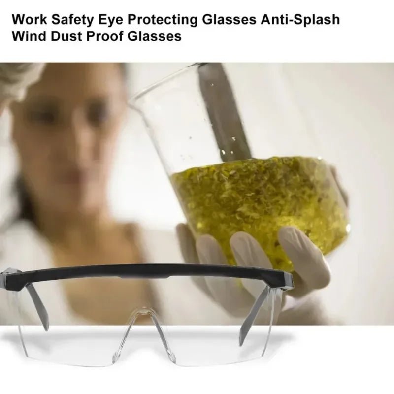Pair of black safety goggles from BACKUPMYFILESNOW.COM® with anti-splash, dust-proof, industrial, lab, and cycling eye protection.