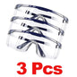 Black anti-splash safety goggles by BACKUPMYFILESNOW.COM® protecting eyes during lab work, industrial tasks, or cycling.