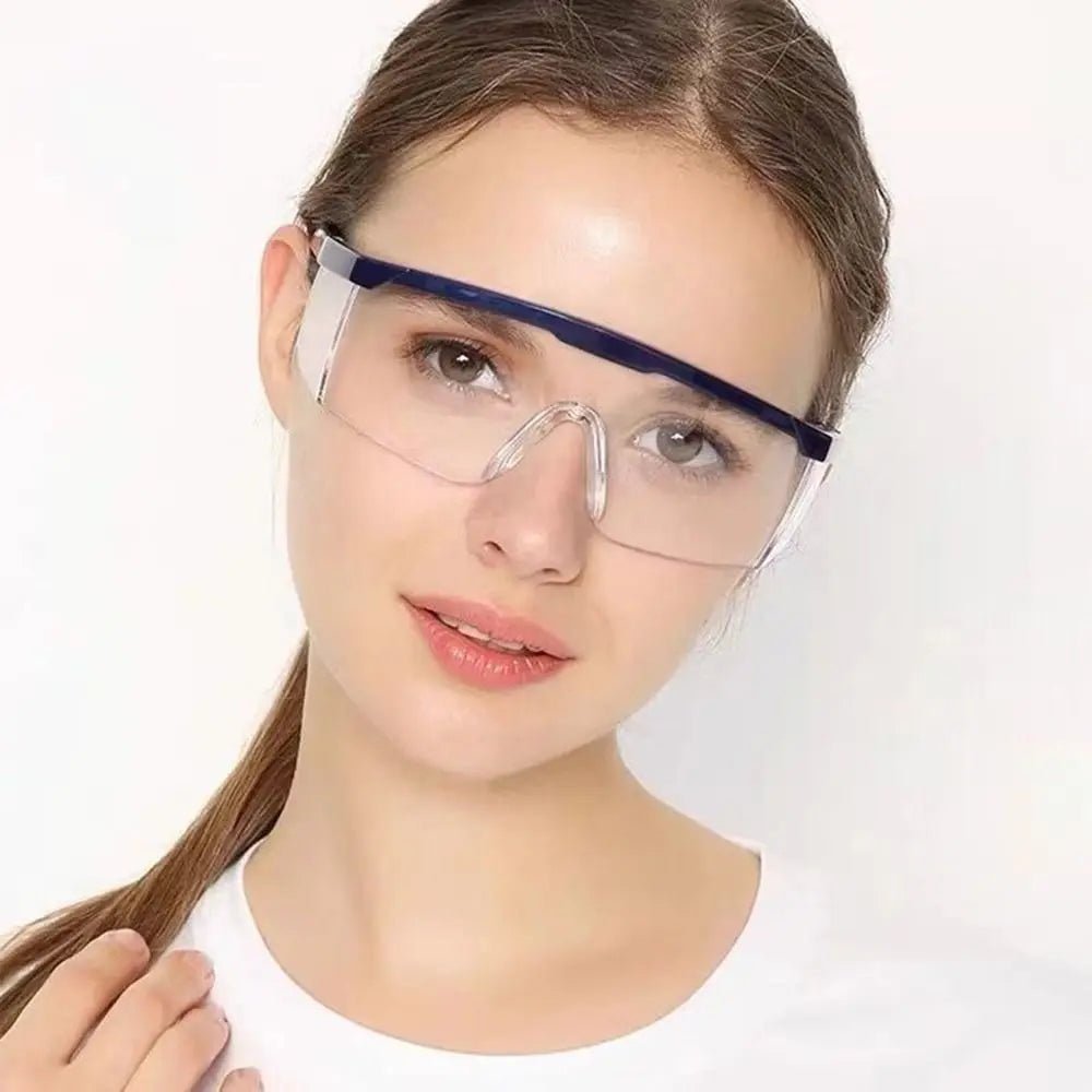 Black safety goggles with anti-splash, windproof, dustproof, waterproof design for work, cycling, and protective eye safety.