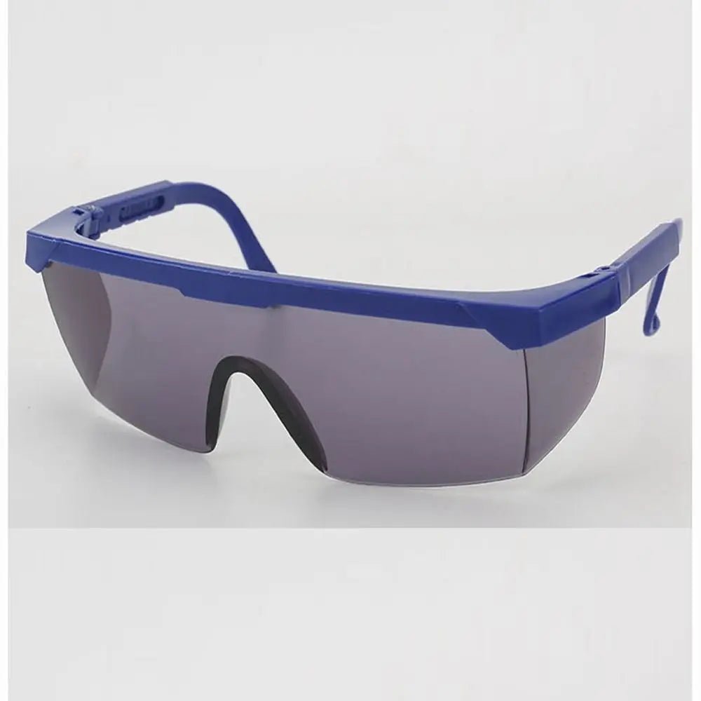 Black work safety goggles with anti-splash, windproof, dustproof, and waterproof protective glasses for cycling and industrial use.