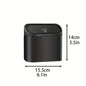 Small black car trash can with lid, leak-proof mini car accessory for keeping your vehicle tidy and organized.