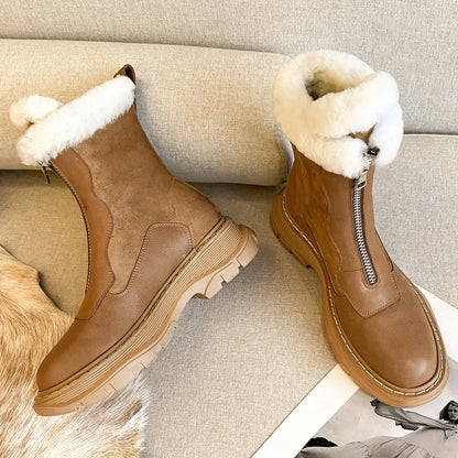 Black women's genuine leather patchwork winter ankle snow boots with front zipper, thick sole, platform, and rugged clod weather design.