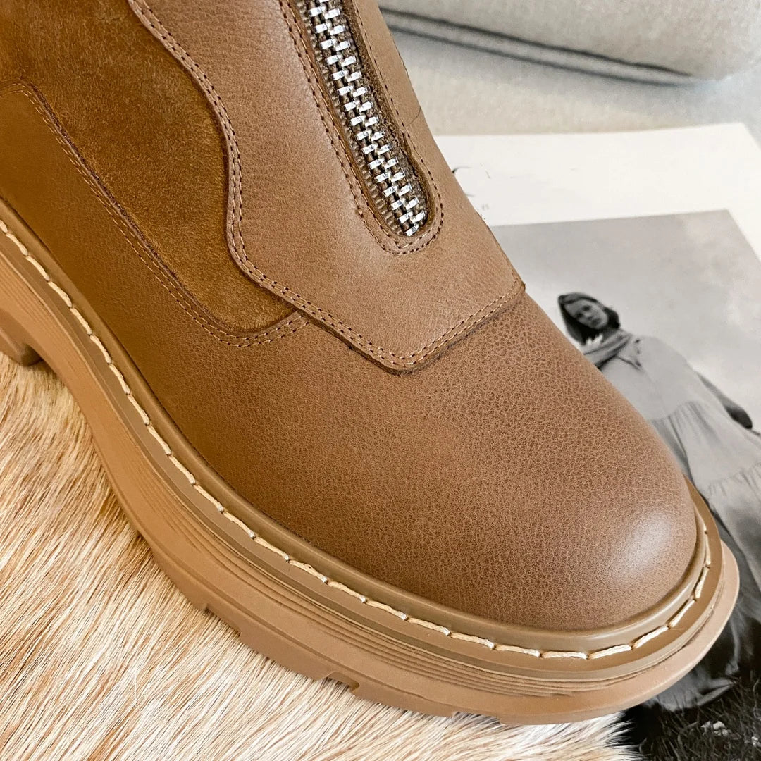 Black women's genuine leather patchwork winter ankle snow boots with front zip, thick sole, platform, and flat clod weather design.