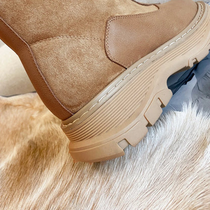 Women's genuine leather patchwork winter ankle snow boots with front zipper, thick sole, platform flats, ideal for cold weather.