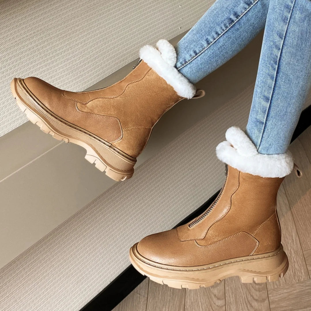 Black women's genuine leather patchwork winter ankle snow boots with front zip, thick sole, platform flats, ideal for cold weather.