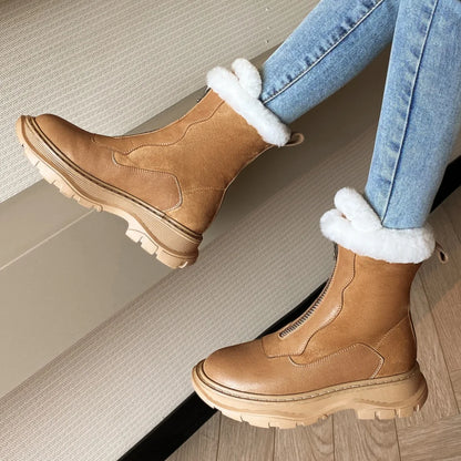Black women's genuine leather patchwork winter ankle snow boots with front zip, thick sole, platform flats, ideal for cold weather.