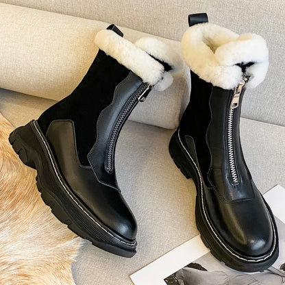 Black women's genuine leather patchwork winter ankle snow boots with front zipper, thick sole, platform, and clod weather design.