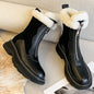 Black women's genuine leather patchwork winter ankle snow boots with front zipper, thick sole, platform, and clod weather design.