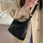 Black 2025 women’s soft PU leather foldable slouchy tote bag with zipper, stylish crossbody purse, vintage design, and spacious interior.
