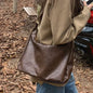Black 2025 women’s soft foldable slouchy tote bag with zipper, stylish PU leather crossbody purse, vintage design.