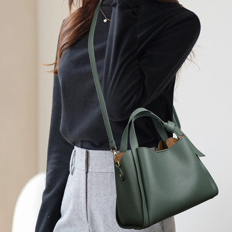 Black women's shoulder handbag with retro style, simple design, large capacity, portable messenger bucket bag by BackupMyFilesNow.com