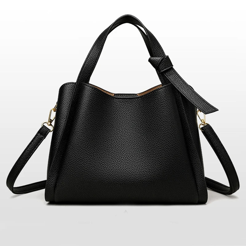 Black women's retro fashion shoulder handbag with simple texture, large capacity, and portable messenger bucket style.