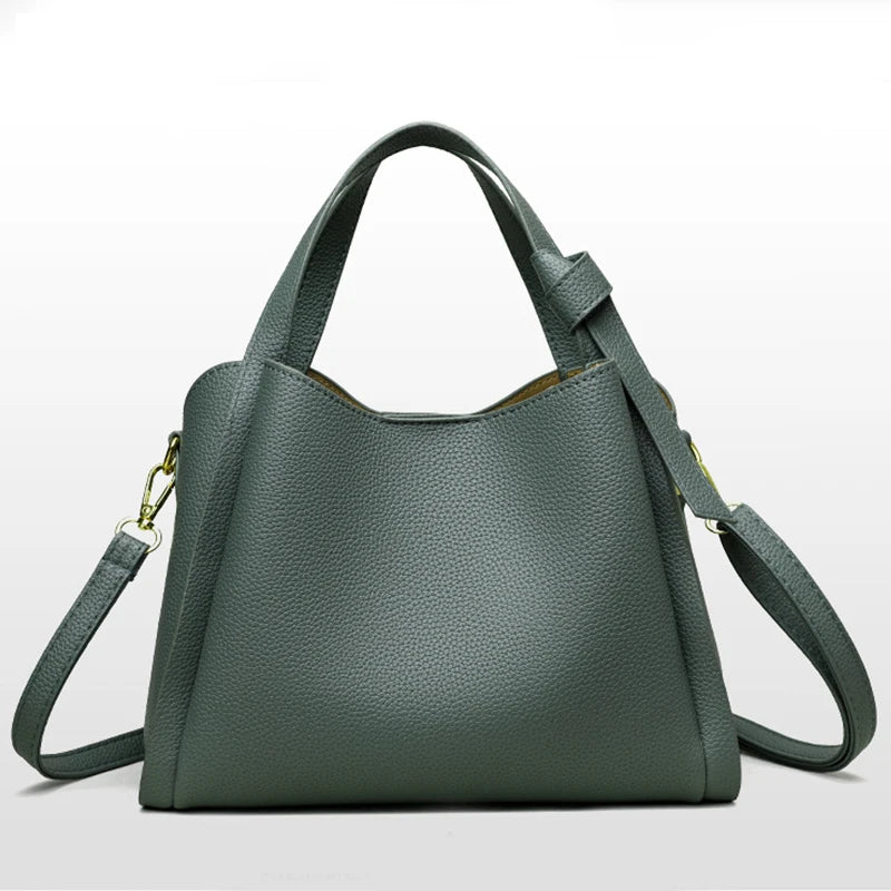 Black women's shoulder handbag with retro style, large capacity, simple design, textured surface, portable messenger bucket bag.