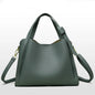 Black women's shoulder handbag with retro style, large capacity, simple design, textured surface, portable messenger bucket bag.