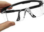 Pair of black anti-splash safety glasses from BACKUPMYFILESNOW.COM® with protective lab, industrial, wind, dust-proof, and cycling features.