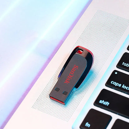 SanDisk Original USB 2.0 Flash Drive in black, available in 16GB, 32GB, 64GB, and 128GB, with a compact pen drive design.