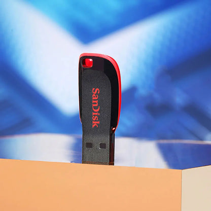 SanDisk Original USB 2.0 flash drive in black, available in 16GB, 32GB, 64GB, and 128GB, with a compact pen drive design.