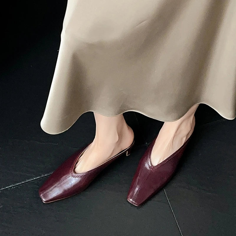 Black genuine leather women's mules with square toe, chunky heel, and soft cover toe sandals for summer and spring.