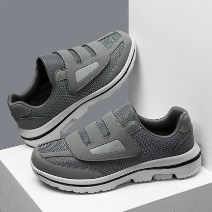 Black wide toe sneakers for women with bunion and swollen feet, orthopedic footwear designed for diabetes and hallux valgus.