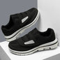 Black wide toe sneakers for women with bunion and swollen feet, orthopedic shoes designed for fat feet and hallux valgus.