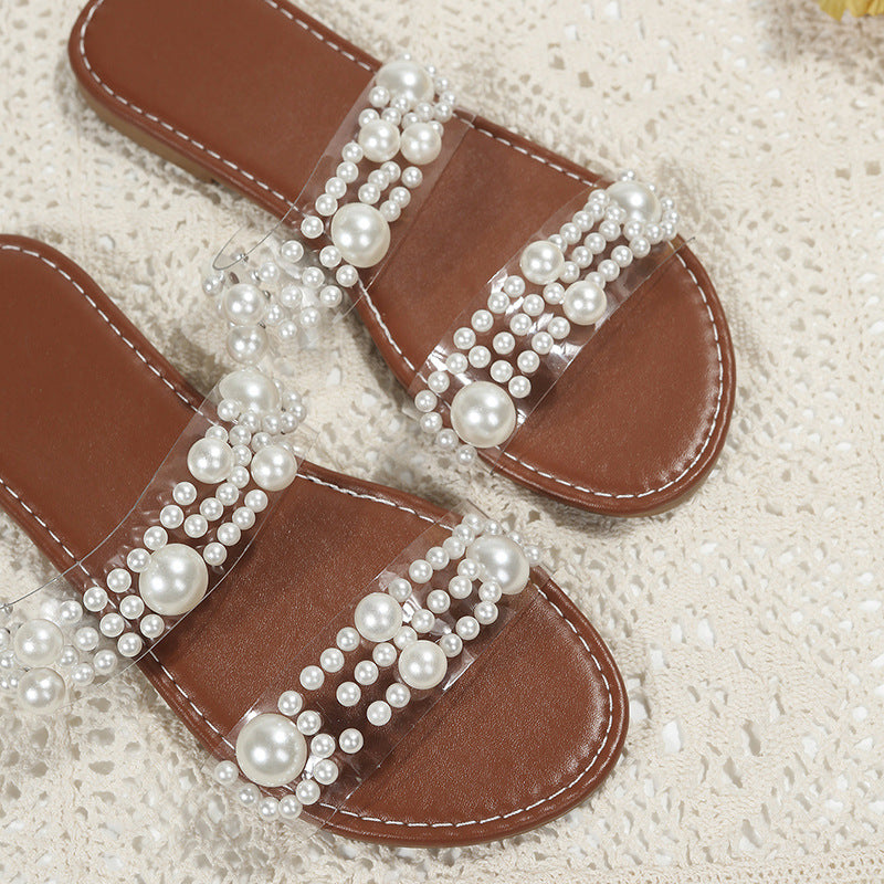 Women’s flat slippers with pearl decoration, perfect for summer beach wear, by BACKUPMYFILESNOW.COM®.