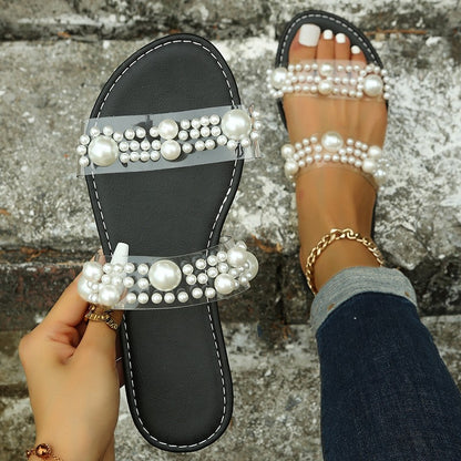 Women's flat beach slippers with pearl decoration, summer slip-ons by BACKUPMYFILESNOW.COM® featuring comfortable flat soles.