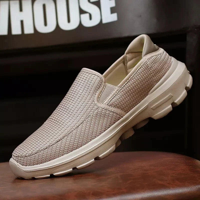 Black men's slip-on loafers, breathable casual driving shoes with non-slip soles, available in size 45, stylish and comfortable.