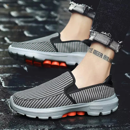 Black men’s slip-on loafers with breathable upper, casual driving shoes, non-slip sole, available in size 45 for comfortable wear.