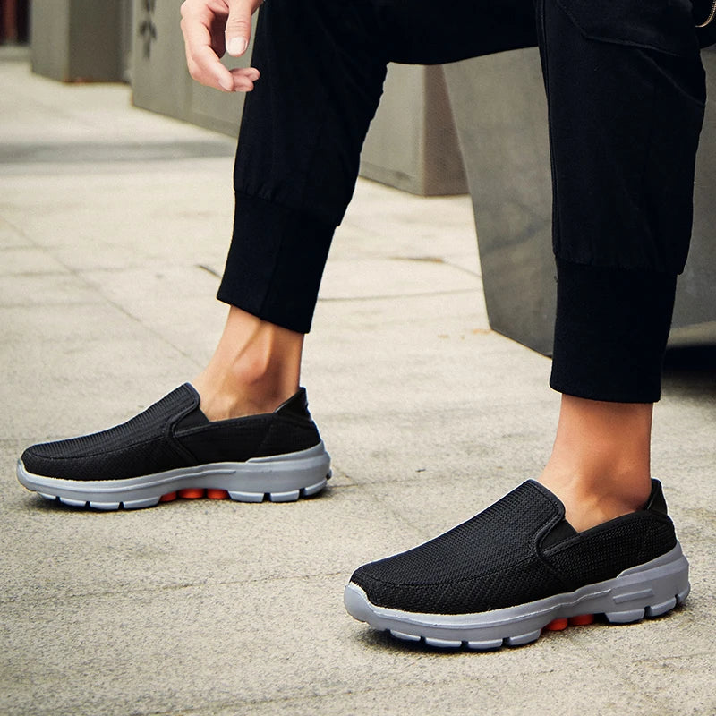 Black men's slip-on loafers from BackupMyFilesNow.com, breathable casual driving shoes with non-slip sole, size 45.