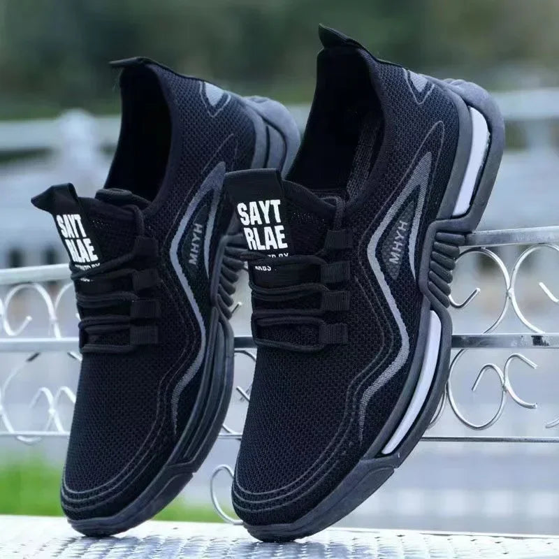 Black men's slip-on fashion sneakers with breathable material, sport-inspired design, non-slip sole, ideal for running, training, and walking.