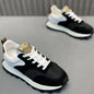 Black men's lug sole anti-skid sneakers with lace-up design, faux leather, wedged heel, ideal for travel and casual walking.