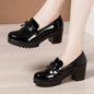 Black lacquer leather medium heel shoes for women with thick waterproof platform soles, stylish British autumn fashion.
