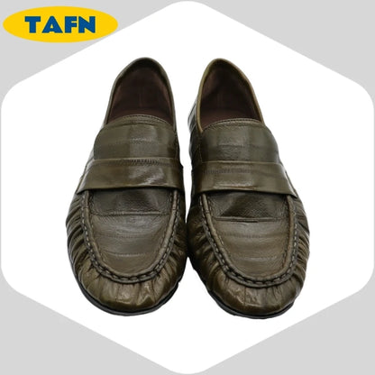 Black slip-on loafers from BackupMyFilesNow.com featuring a trendy, comfortable, high-end design with a simple, refined style.