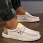 Black men's canvas loafers with breathable fabric, casual driving and walking shoes with vulcanized flat sole for comfort.