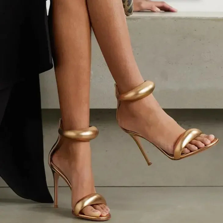 Elegant gold high-heeled sandals for women, perfect for weddings and banquets, featuring a simple, luxury style.