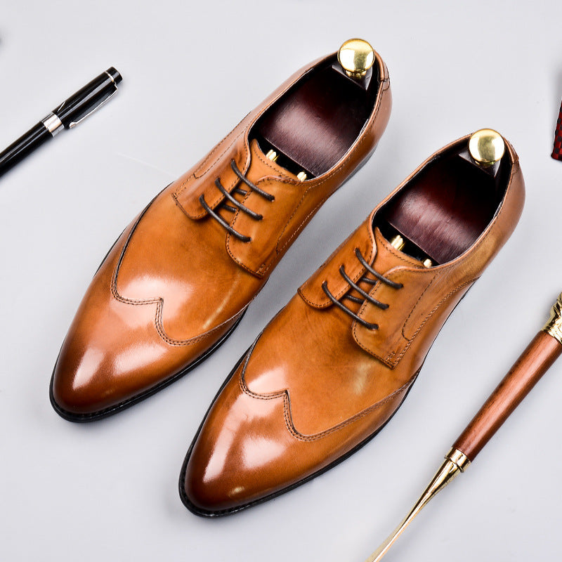 Black British business shoes by BackupMyFilesNow.com, made of polished leather with lace-up design and formal style.