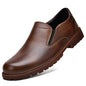 Black men's slip-on oxford loafers with a sleek leather finish, casual Italian style, and clean pure color design.